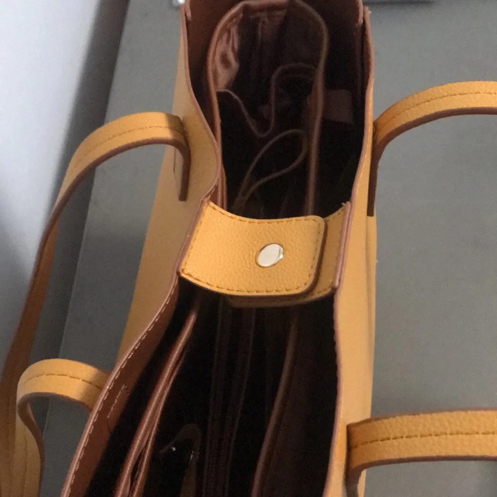Tommy Bahama Reversible Faux Leather Tote Wristlet - Picture 7 of 16